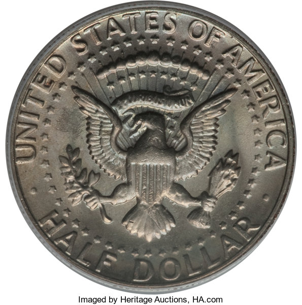 1999 Kennedy half dollar reverse close-up showing the FG initials area below the eagle's left leg